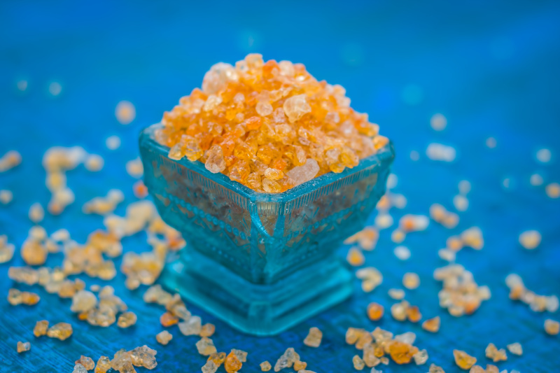 Close up of Edible gum,Gond,acacia gum in a blue colored bowl.
