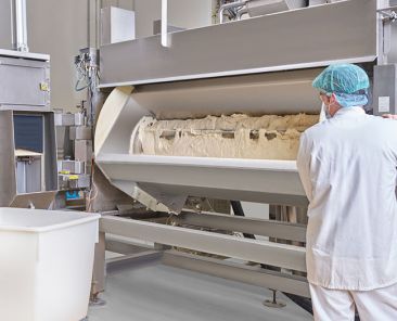 f2m-bbi-02-24-kneading and mixing-VMI_Continuous mixers_Verymix_with dough_and_operator