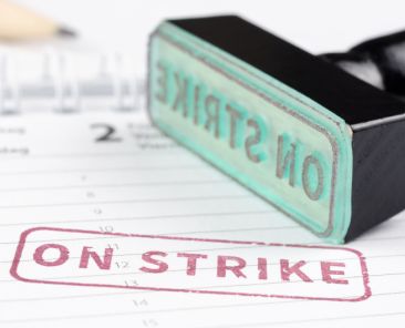 Close up shot of on strike stamp on a planner